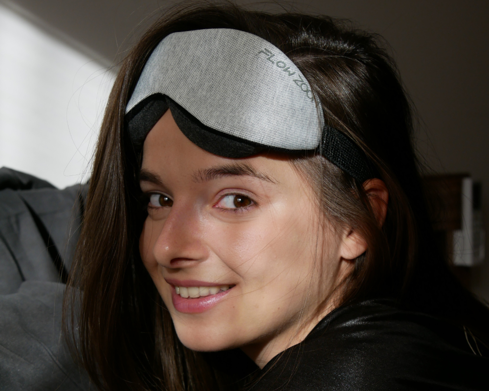 A woman wearing a sleepmask